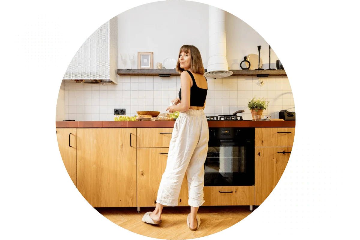 woman enjoying in kitchen